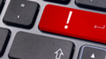 Keyboard with red ! key