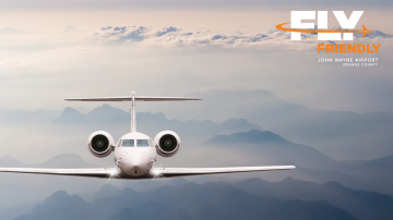 Plane flying through sky