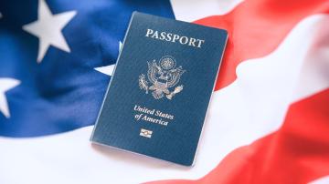 Passport on top of American Flag