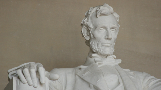 a statue of abraham lincoln in the lincoln memorial in washington, dc