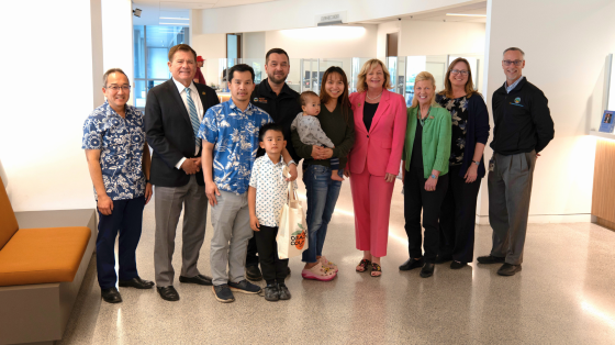 (Left to Right) Kevin Onuma, OC Public Works Director, Chair Doug Chaffee, Fourth District Supervisor, a family from Santa Ana, Hugh Nguyen, Clerk-Recorder, Vice Chair Katrina Foley, Fifth District Supervisors, Shari Freidenrich, Treasurer-Tax Collector, Kimberly Engelby, Chief Financial Officer, and Dylan Wright, OC community Resources Director.