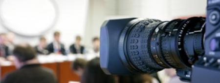 Video camera recording meeting