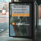 Bus stop advertisement display, displaying information about OC Links, a mental health resource