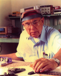 Clarence "Leo" Fender, Orange County Hall of Fame Inductee, Class of 2024, Leo Fender repairing a guitar in his shop