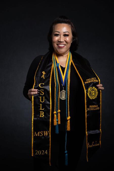 Image of Wynn Nguyen with her graduation stole